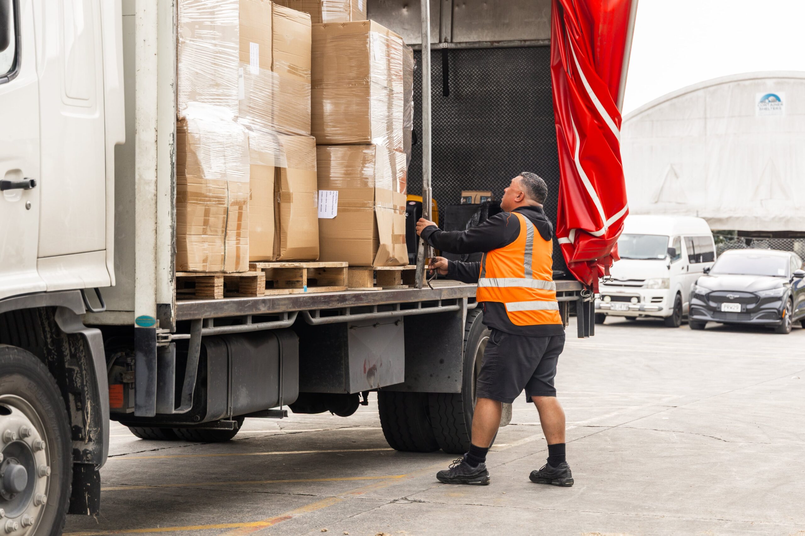 Worker Loading Truck